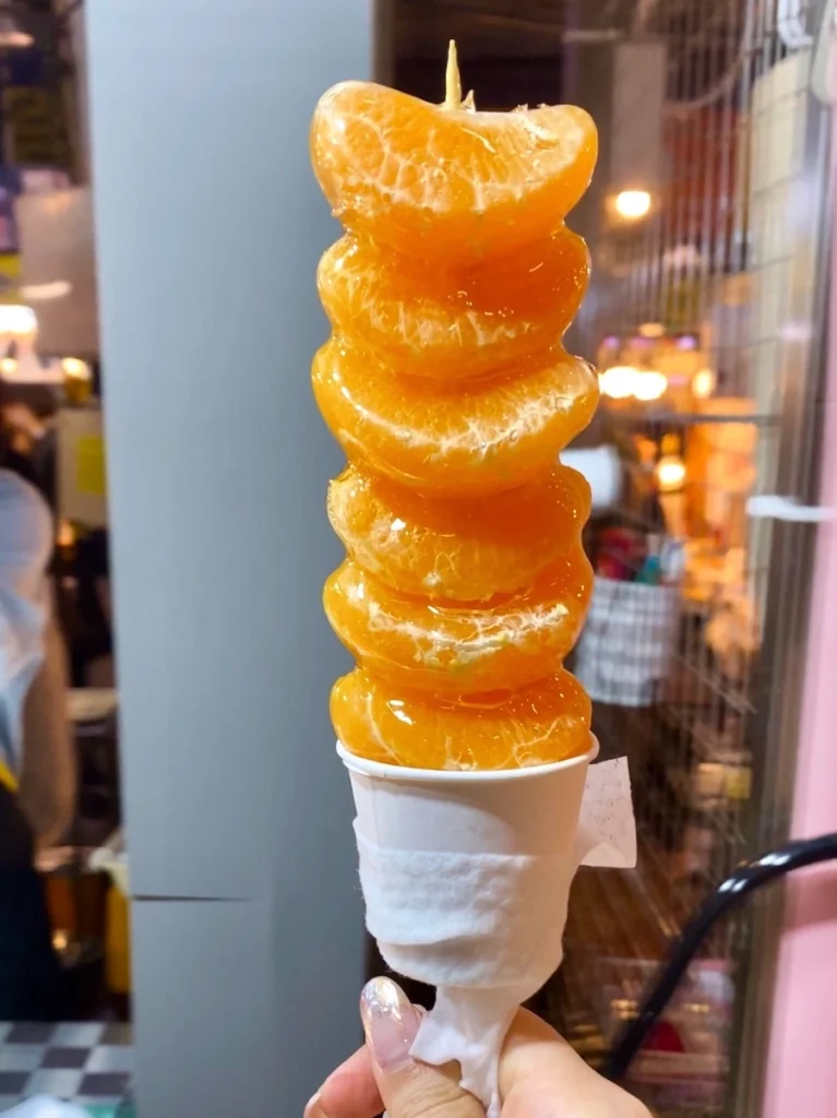 西歸浦偶來市場的橘子糖葫蘆